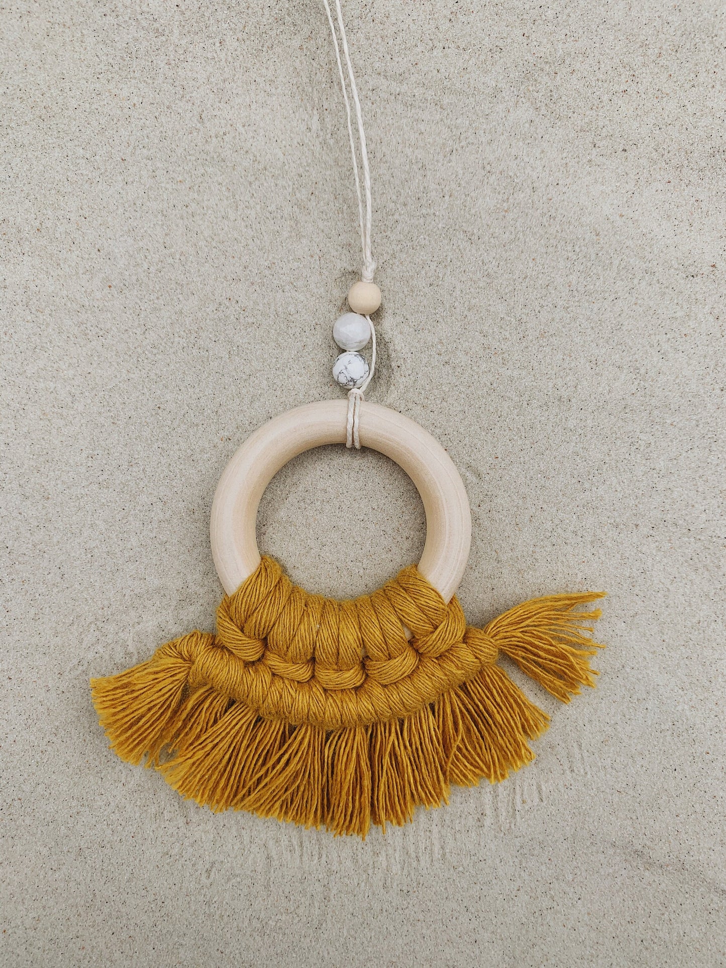 boho macrame rearview mirror charm in mustard with stones (white howlite)